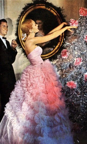Why yes, I shall wear a pink tulle gown while I decorate the tree with roses...doesn't everyone?