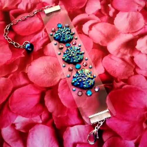 "Sparkly" new floating blue hearts bracelets. http://madamexapparel.storenvy.com